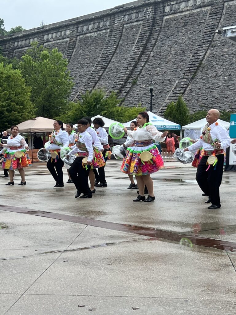 Dance group at Hispanic American festival dancing in front of Kensico Dam
