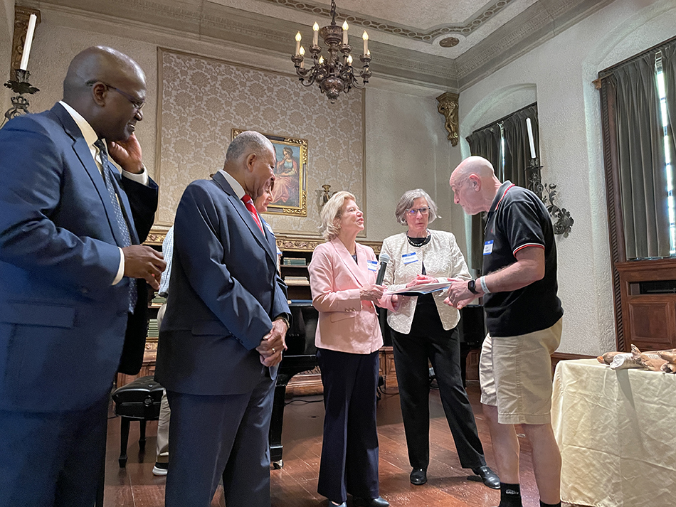 state senator Maye extends hand to volunteer