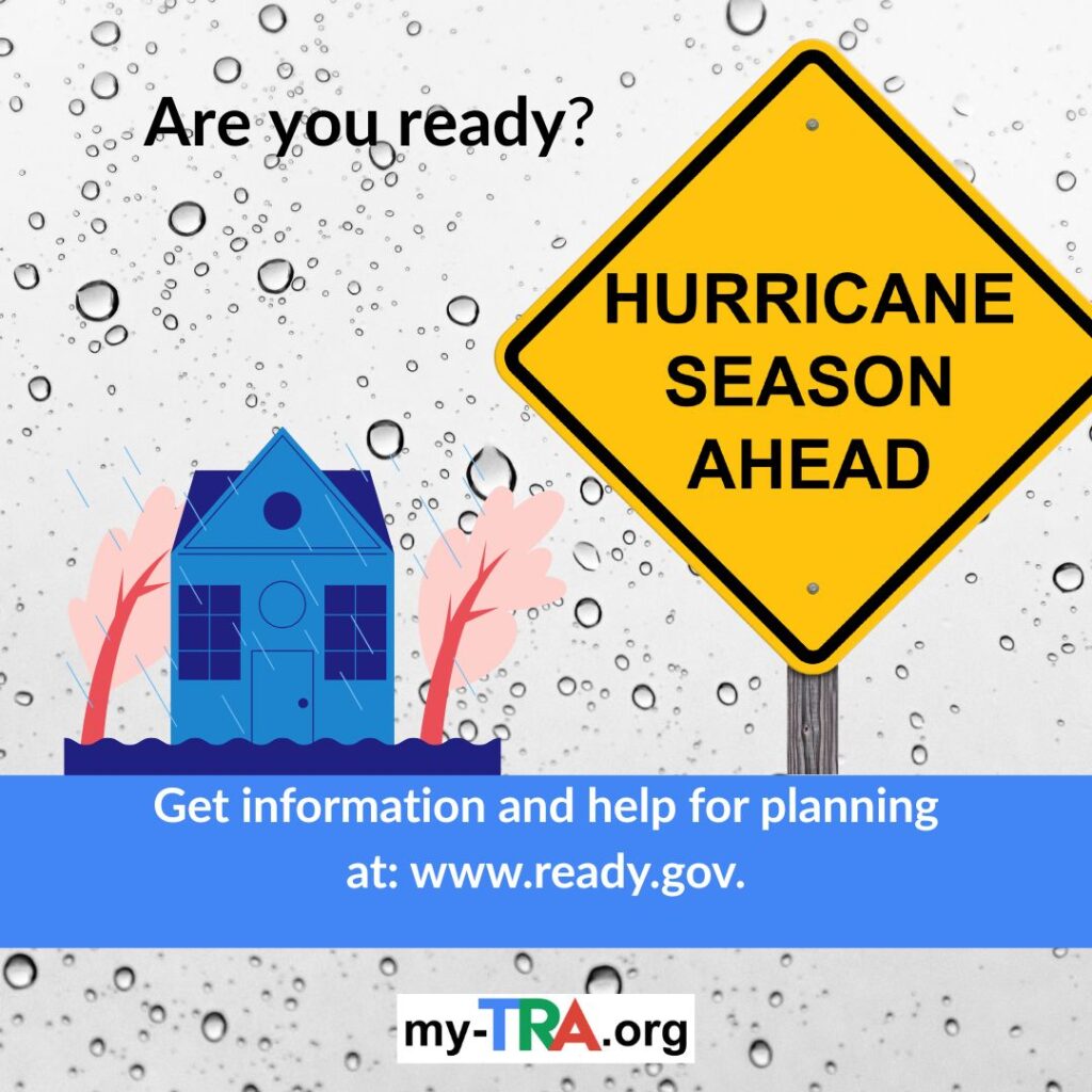 Hurricane Season Ahead sign with rain drops, blue house and wind blown trees