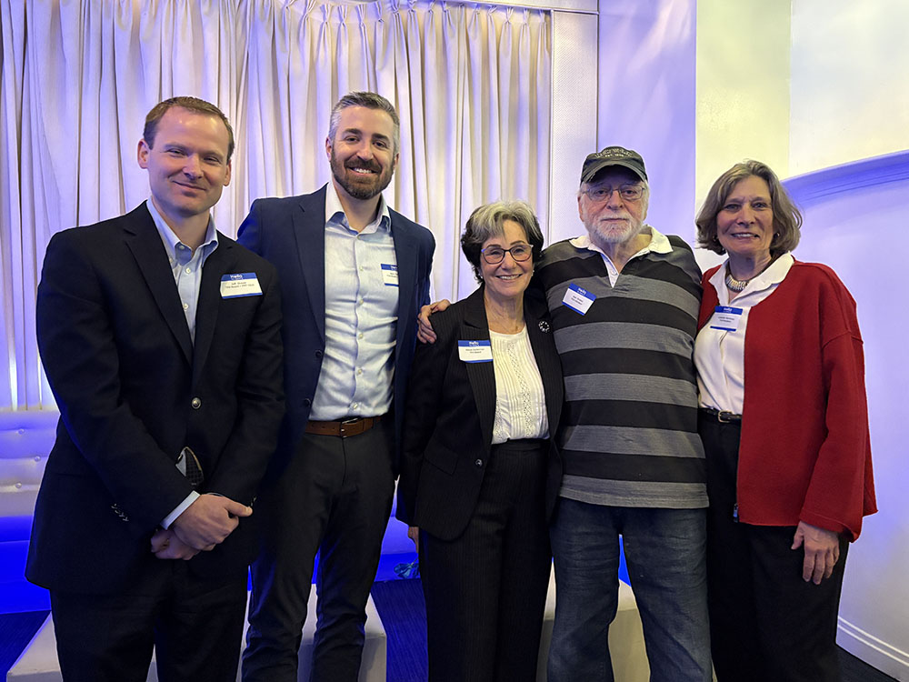 Four honorees at awards brunch stand with TRA Presidend
